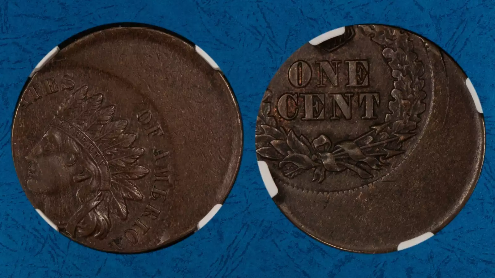 1877 Indian Head penny off-center strike error showing design displacement with visible date
